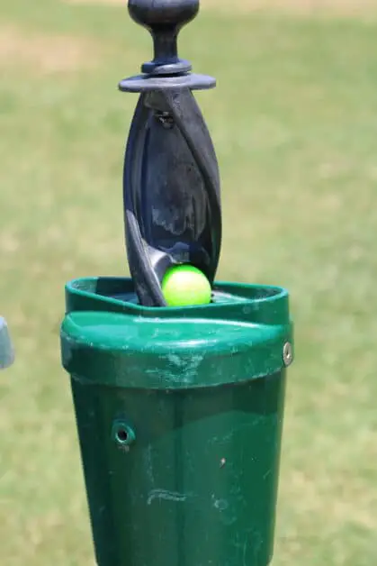 golf bag with golf club for short shots like a chip shot
