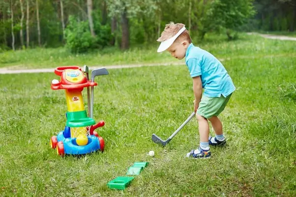 Child golfing